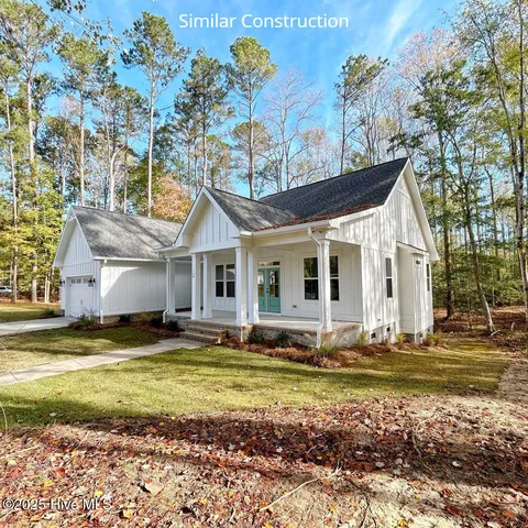 $509,000 | 128 West Burton Farm Drive, Minnesott Beach, NC 28510