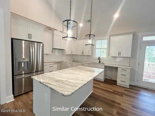 $509,000 | 128 West Burton Farm Drive, Minnesott Beach, NC 28510