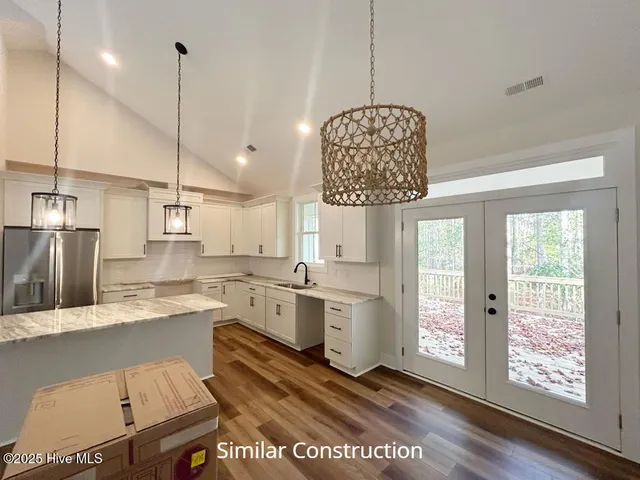 $509,000 | 128 West Burton Farm Drive, Minnesott Beach, NC 28510