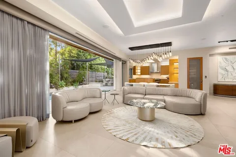 a living room with furniture and a view of living room