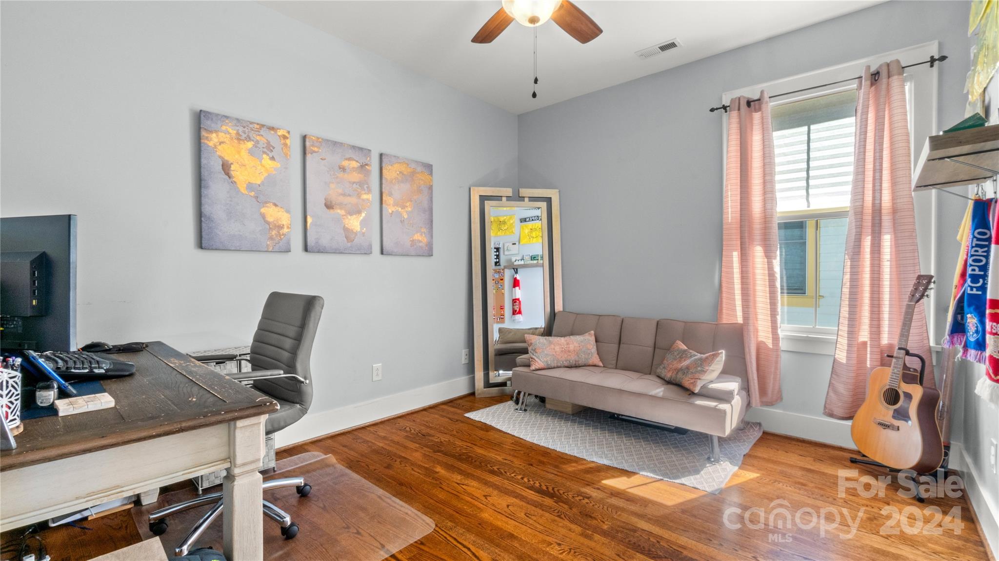 444 Hollyhock Lane Fort Mill, SC 29708 - Photo 21 of 30 a living room with furniture and a flat screen tv