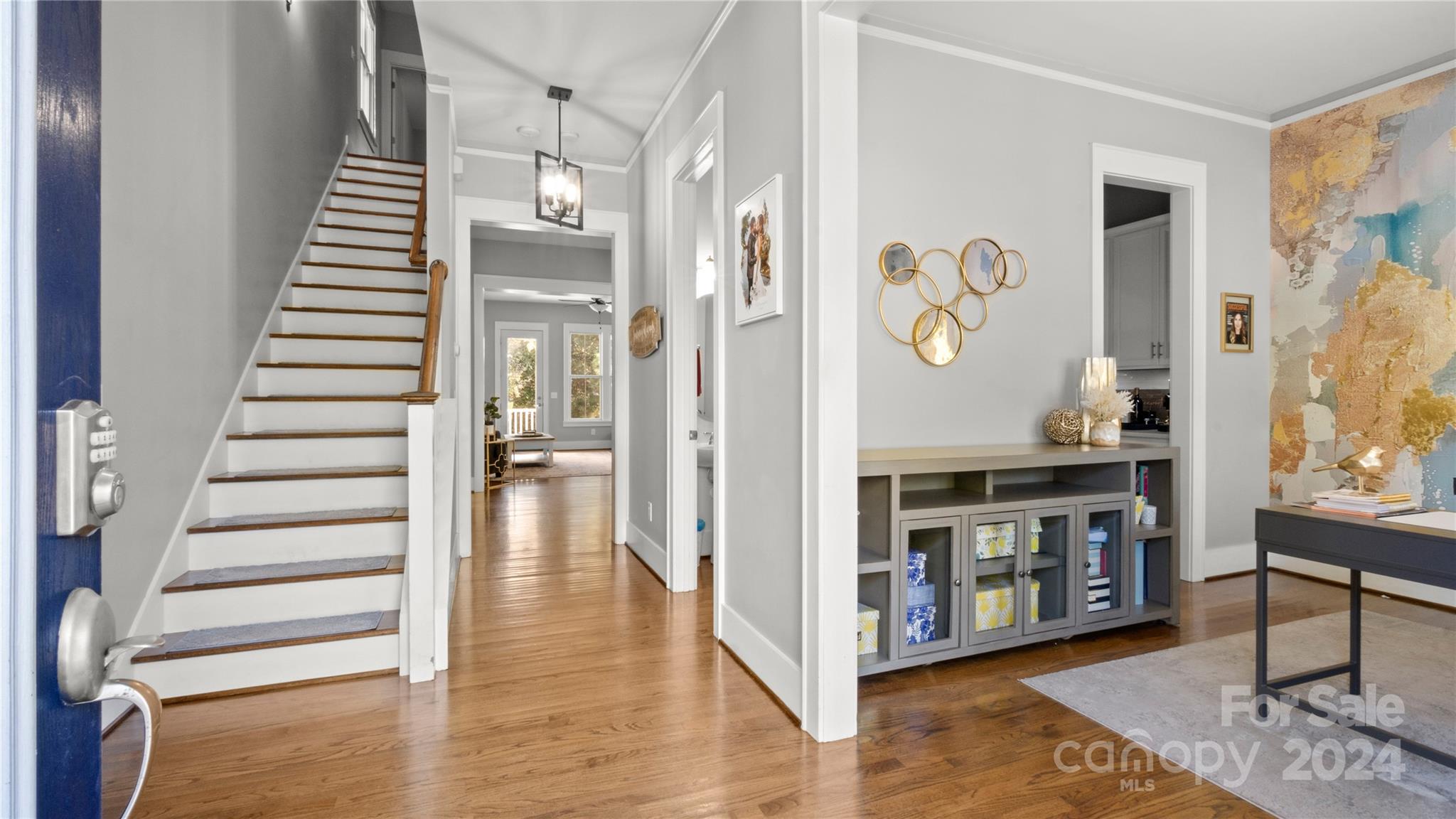 444 Hollyhock Lane Fort Mill, SC 29708 - Photo 5 of 30 a view of an entryway with wooden floor and windows