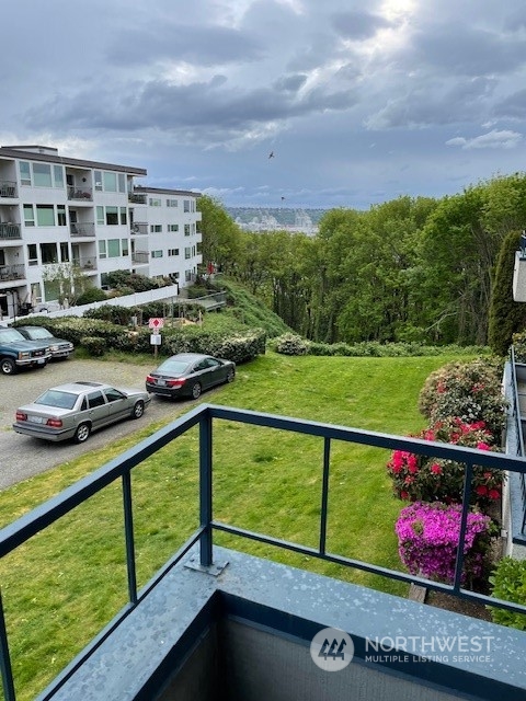 a view of a balcony with lake view
