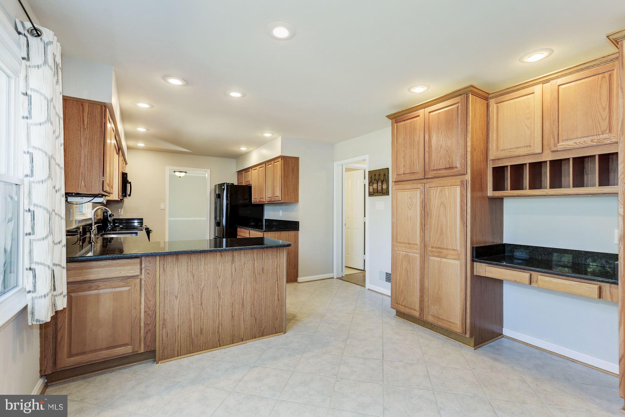 7982 Counselor Road Manassas, VA 20112 - Photo 12 of 30 Large eat in kitchen with tons of cabinet space