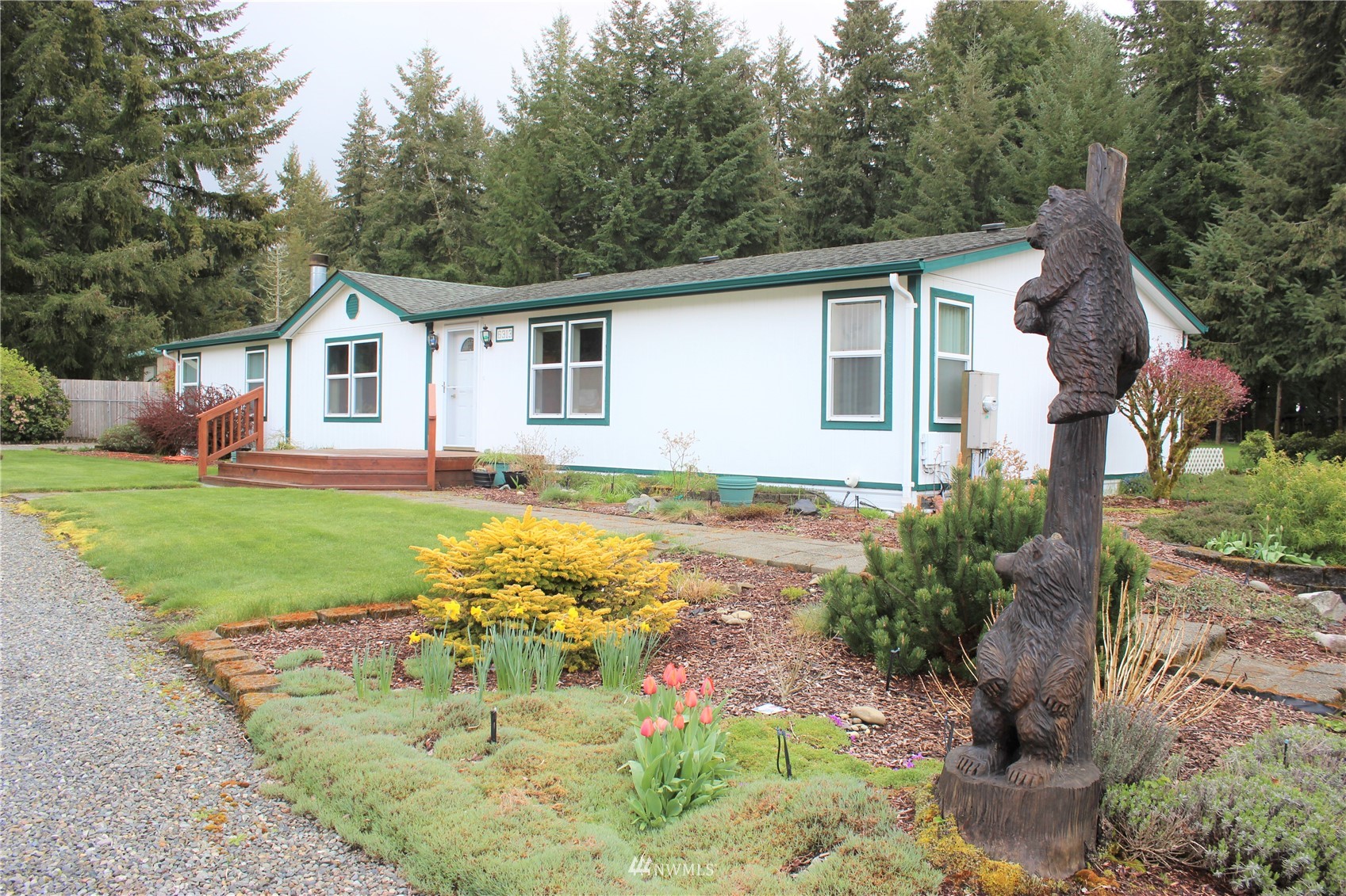 6313 190th Lane Southwest Rochester, WA 98579 - Photo 2 of 37 a view of backyard of the house