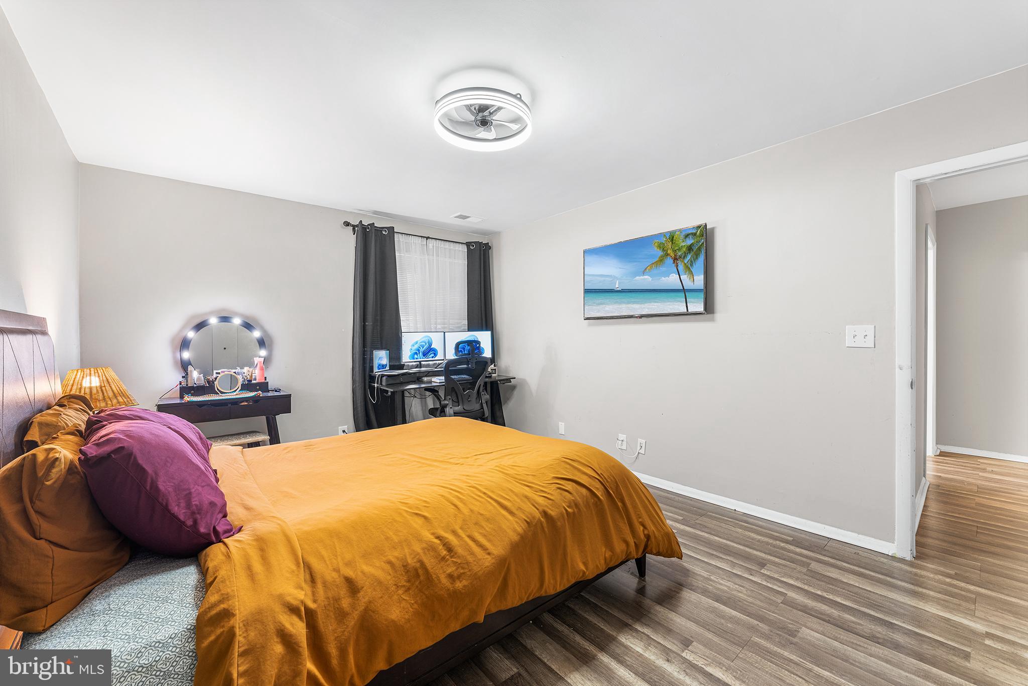 115 East Kings Highway, Unit 186 Maple Shade, NJ 08052 - Photo 16 of 25 a bed sitting in a bedroom and view of living room