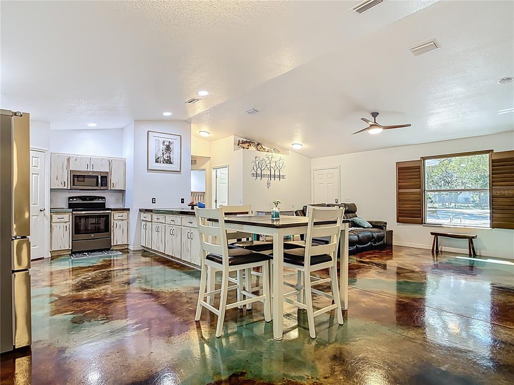 3114 Southeast Brown Road Arcadia, FL 34266 - Photo 15 of 61 a large kitchen with a table and chairs