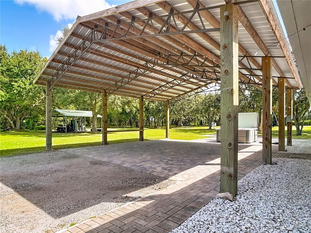 3114 Southeast Brown Road Arcadia, FL 34266 - Photo 44 of 61 a view of a swimming pool with an outdoor space