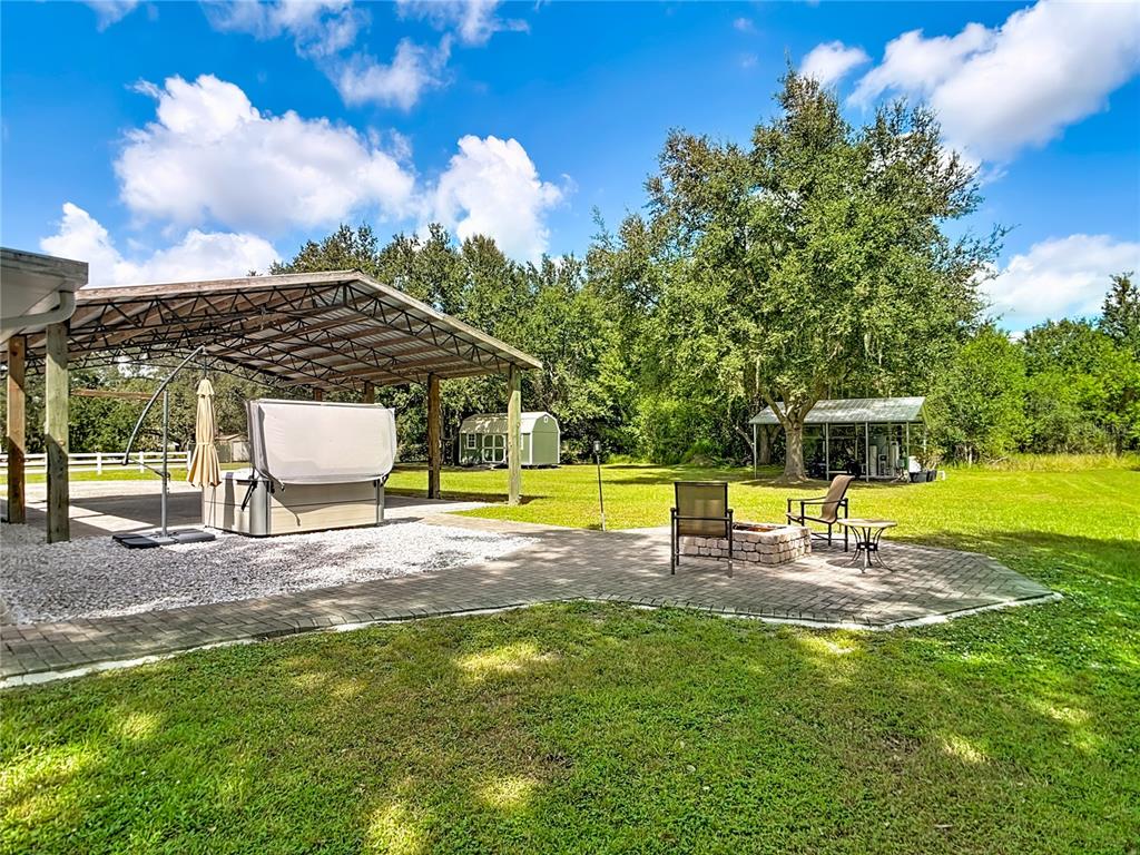 3114 Southeast Brown Road Arcadia, FL 34266 - Photo 49 of 61 a view of a swimming pool with a patio