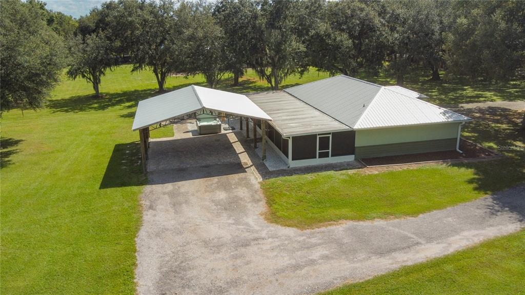 3114 Southeast Brown Road Arcadia, FL 34266 - Photo 60 of 61 a view of a house with a yard