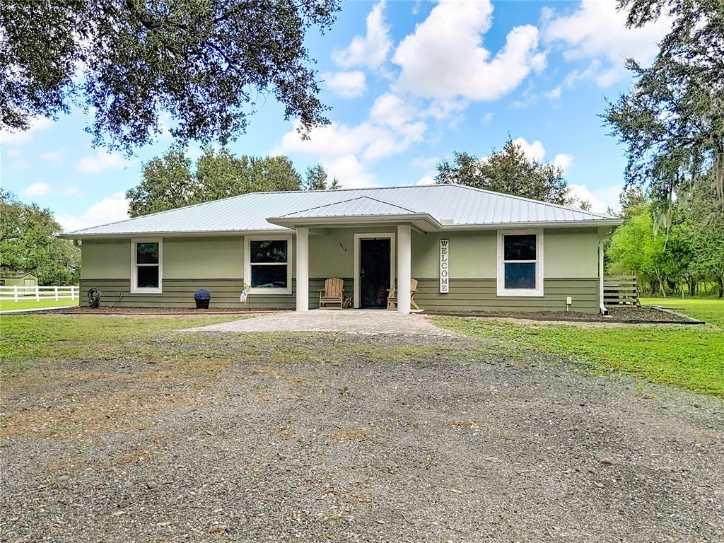 3114 Southeast Brown Road Arcadia, FL 34266 - Photo 7 of 61 a front view of house with yard and green space