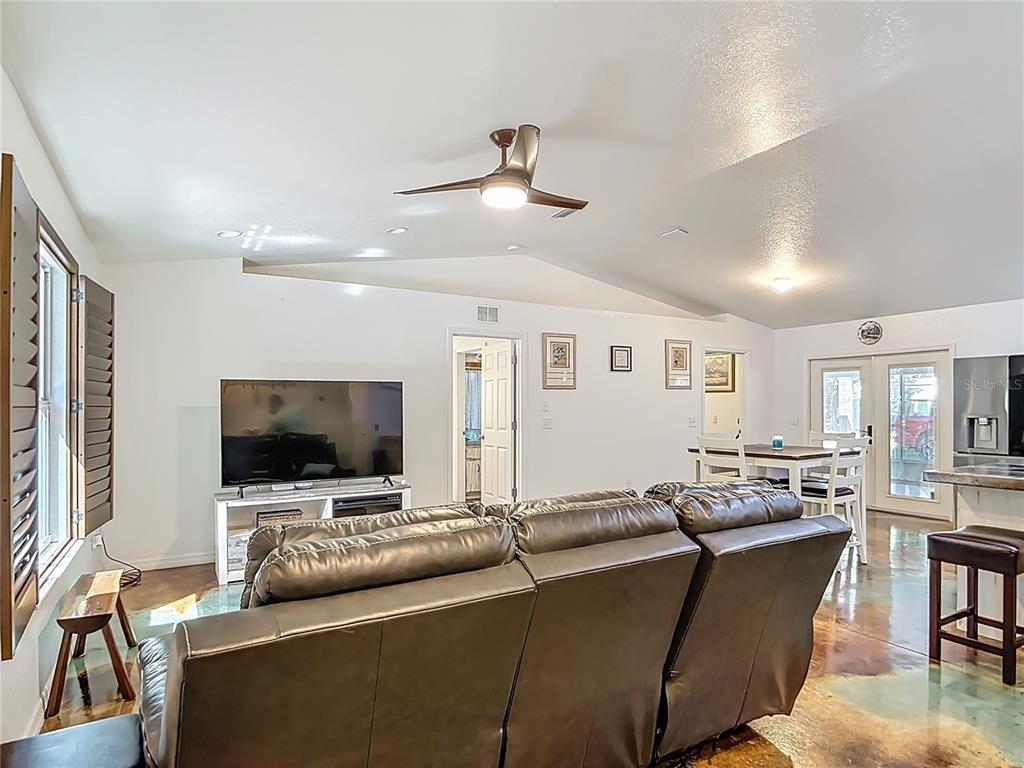 3114 Southeast Brown Road Arcadia, FL 34266 - Photo 9 of 61 a living room with furniture and a flat screen tv
