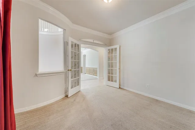 an empty room with entrance and door