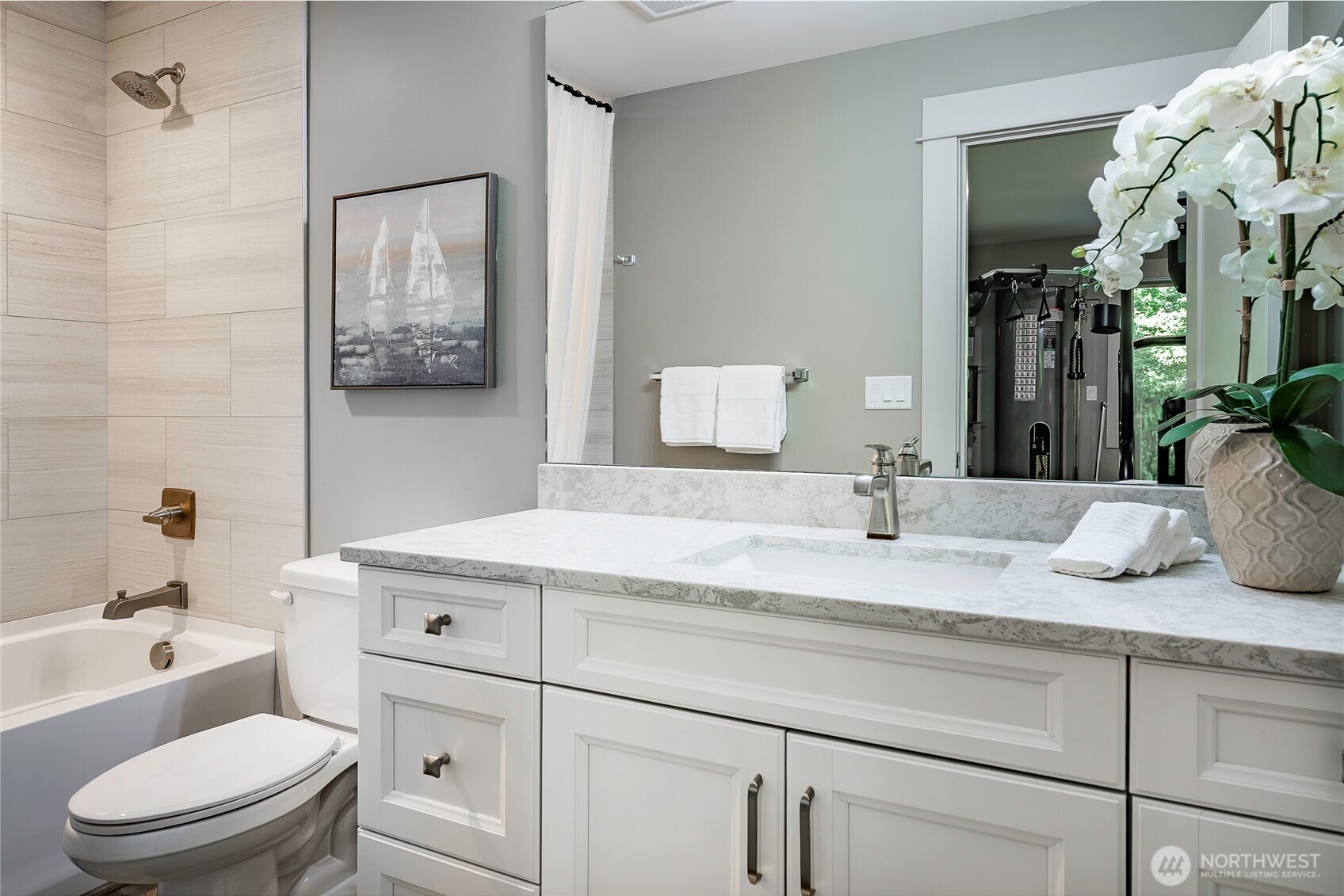 9125 Shearwater Road Blaine, WA 98230 - Photo 29 of 40 a bathroom with a granite countertop sink mirror vanity and toilet