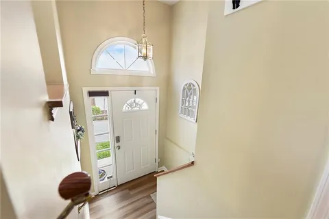 a view of entryway with wooden floor