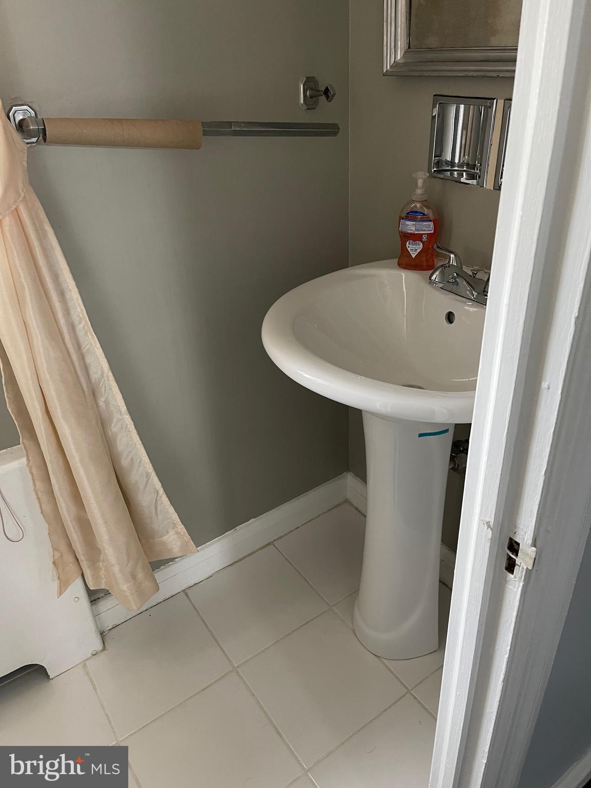 606 Winans Way Baltimore, MD 21229 - Photo 5 of 17 Main level updated powder room