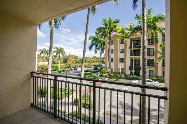 a car parked in front of a brick building