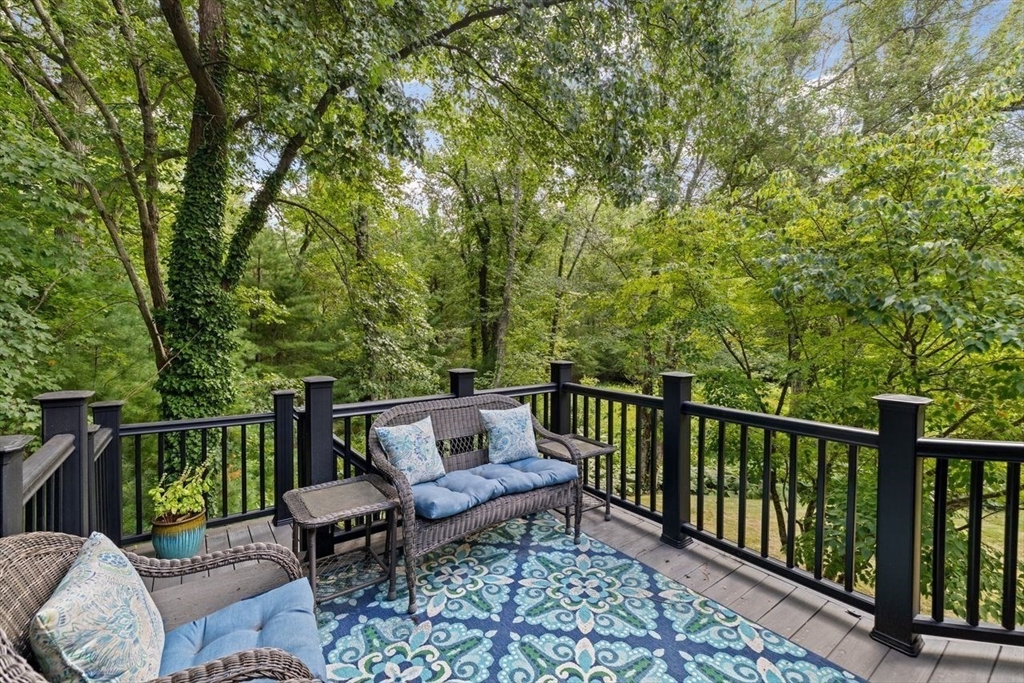131 Cross Street Norwell, MA 02061 - Photo 11 of 41 a view of a two chairs in the deck