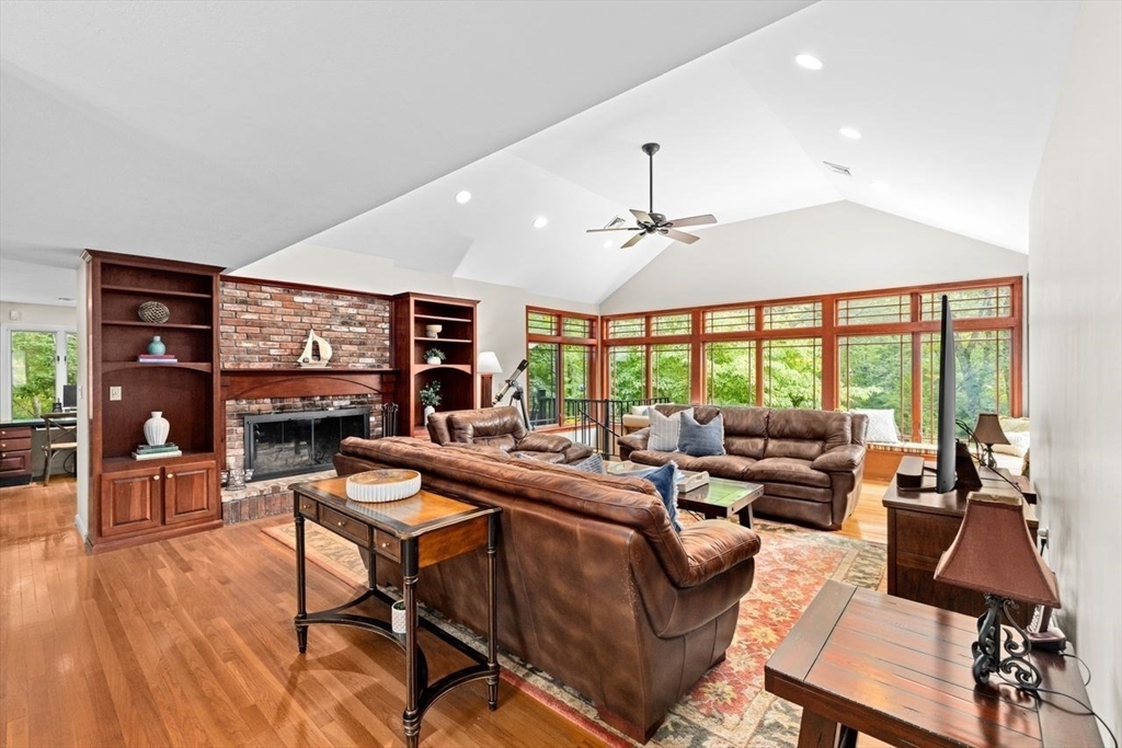 131 Cross Street Norwell, MA 02061 - Photo 2 of 41 a living room with furniture and a large window