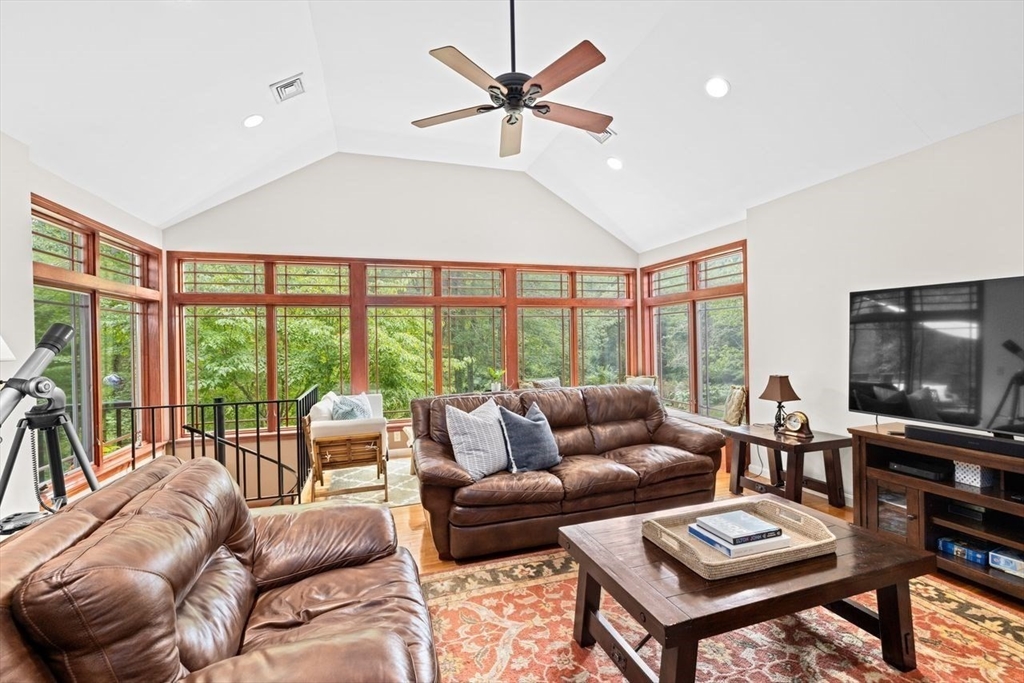 131 Cross Street Norwell, MA 02061 - Photo 3 of 41 a living room with furniture and a flat screen tv