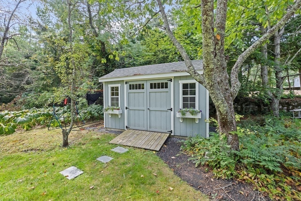 131 Cross Street Norwell, MA 02061 - Photo 33 of 41 front view of a house with a yard