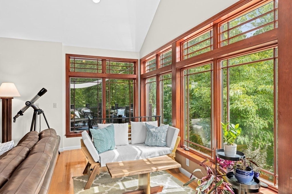 131 Cross Street Norwell, MA 02061 - Photo 5 of 41 a living room with furniture and floor to ceiling windows