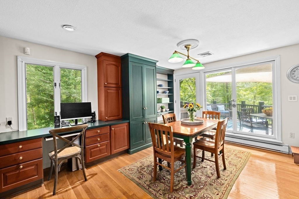 131 Cross Street Norwell, MA 02061 - Photo 10 of 41 a view of a dining room with furniture window and outside view
