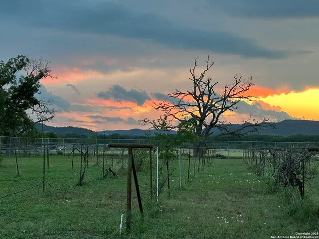 a view of a lake with a big yard