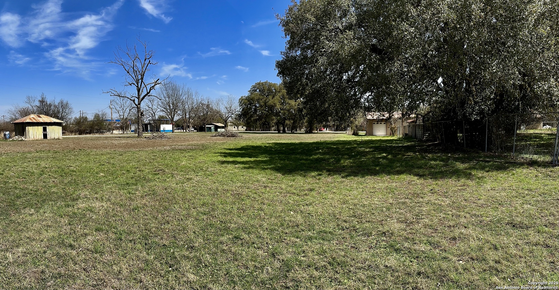 779 Main Street Utopia, TX 78884 - Photo 8 of 22 a view of backyard with green space