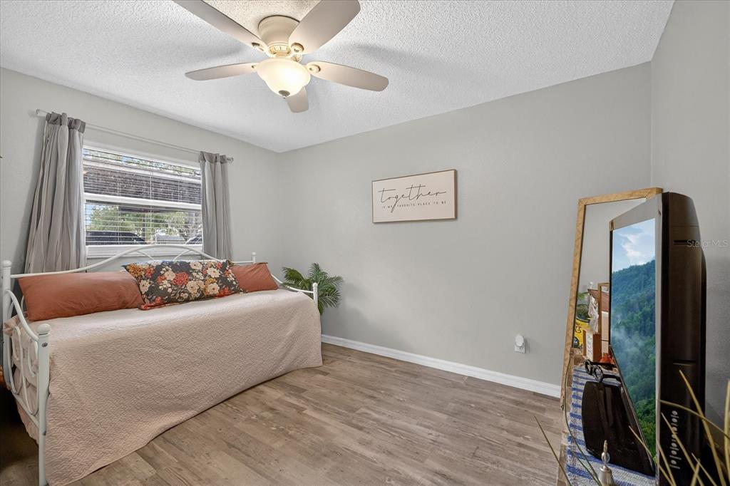 3230 Teeside Drive New Port Richey, FL 34655 - Photo 17 of 31 a living room with furniture and a flat screen tv