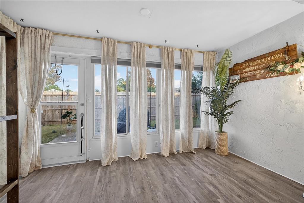 3230 Teeside Drive New Port Richey, FL 34655 - Photo 20 of 31 a view of entryway with wooden floor and front door