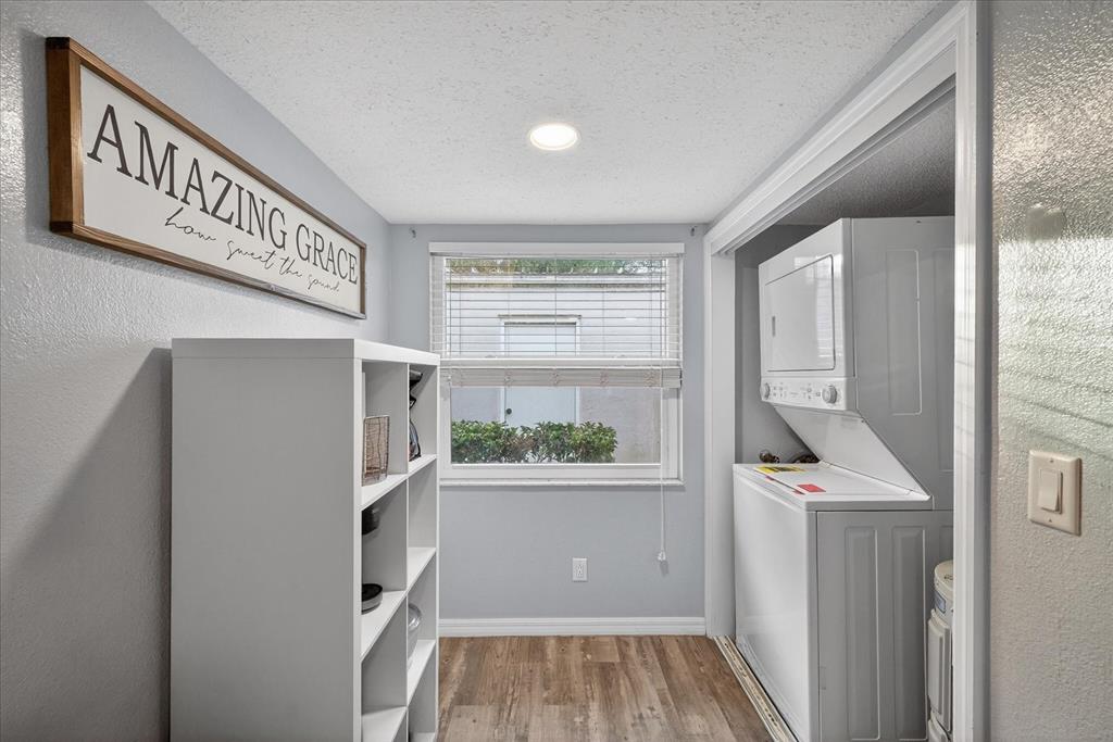 3230 Teeside Drive New Port Richey, FL 34655 - Photo 8 of 31 a kitchen with white cabinets and window