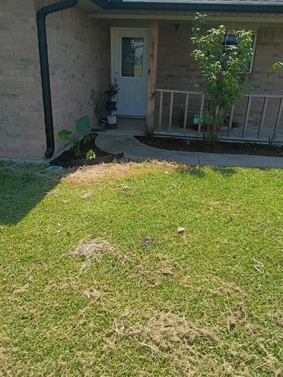 634 East Eubank Street Mabank, TX 75147 - Photo 11 of 40 a view of a backyard with plants and large trees