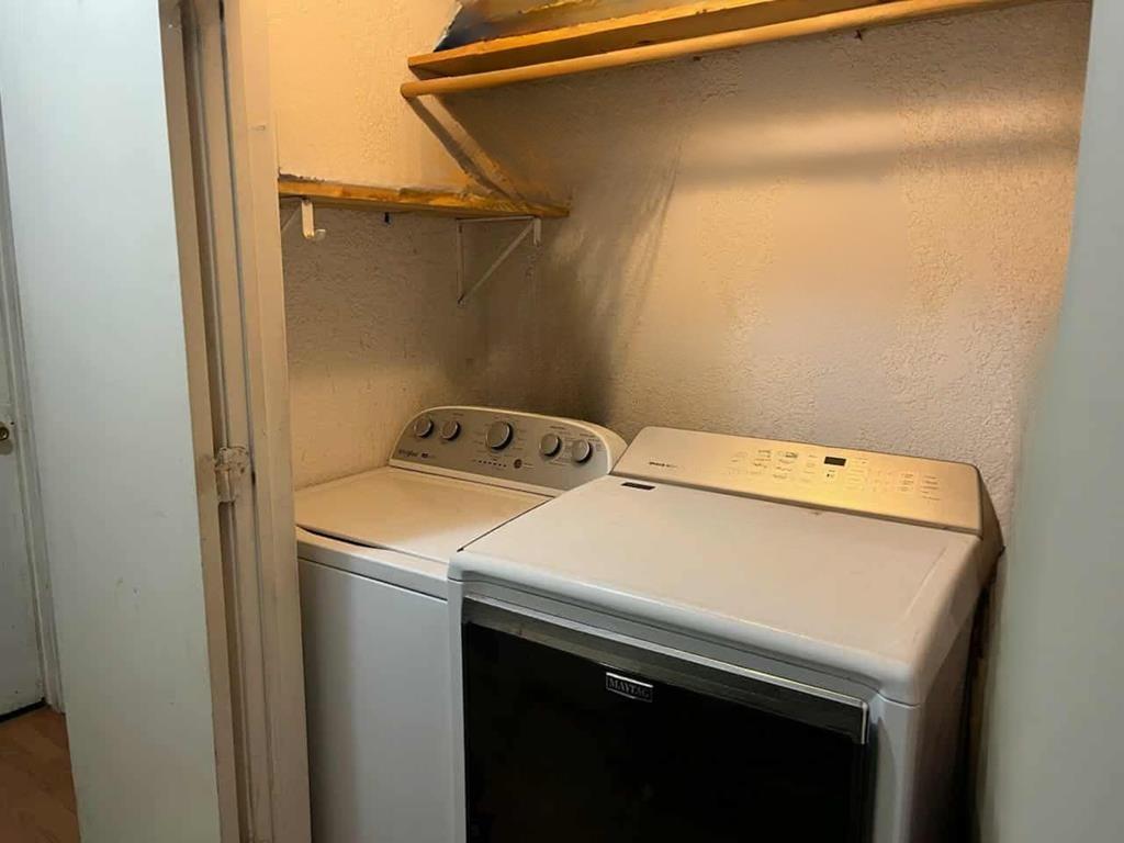 634 East Eubank Street Mabank, TX 75147 - Photo 14 of 40 a utility room with dryer and washer
