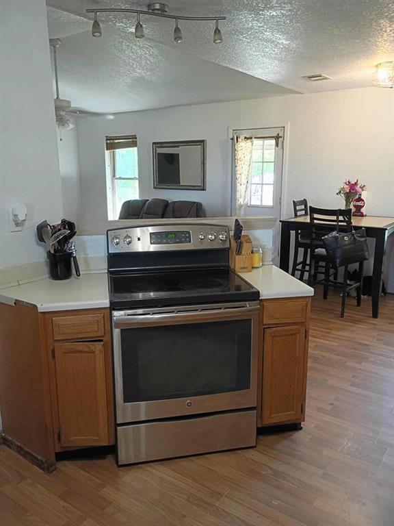 634 East Eubank Street Mabank, TX 75147 - Photo 24 of 40 a kitchen with a stove and a sink