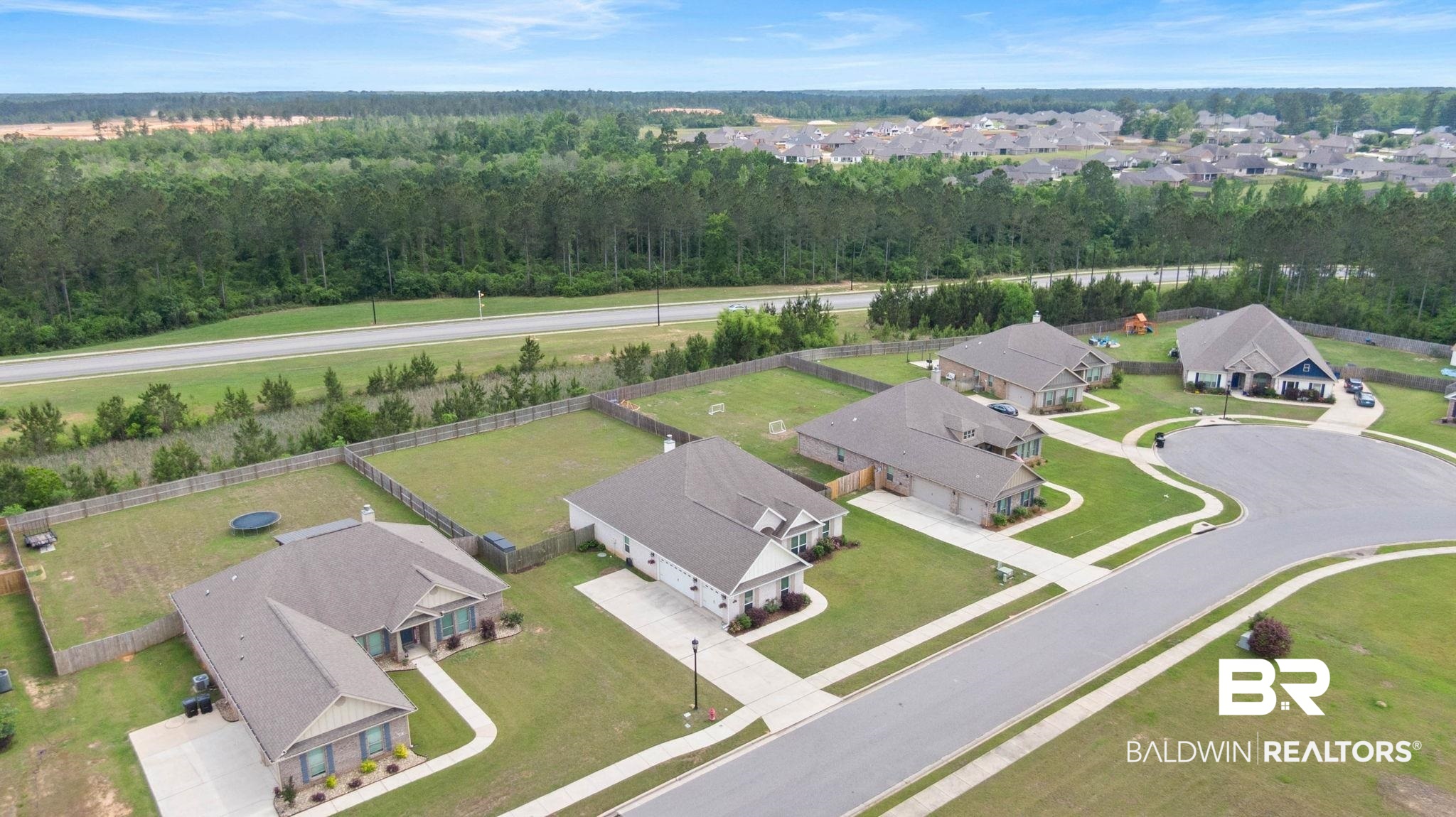 31187 Spoonbill Road Daphne, AL 36527 - Photo 73 of 85 Residential neighborhood featuring single-story homes, paved streets, and manicured lawns
