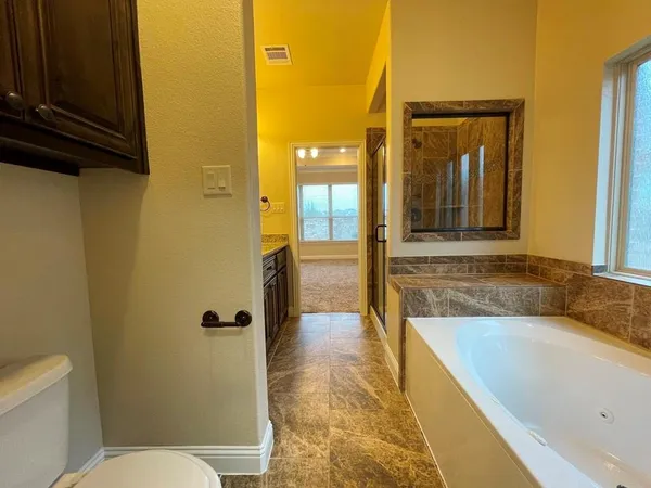a view of storage and utility room with empty racks