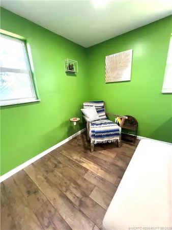 a living room with a flat screen tv