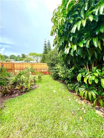 a view of a lake with a big yard