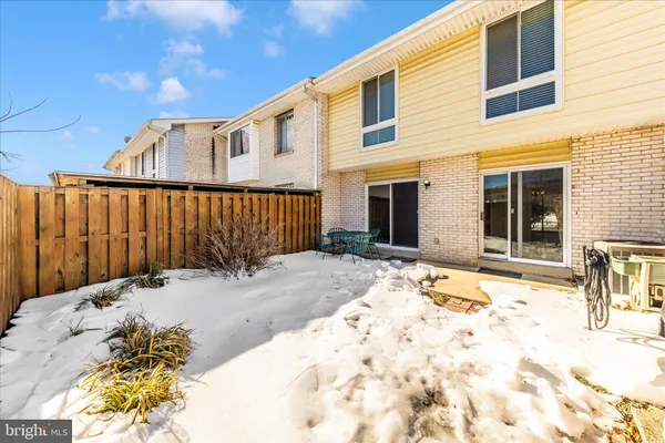 a view of a backyard with a patio