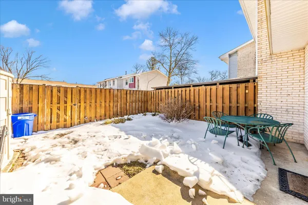 a view of a car parked in front of a house