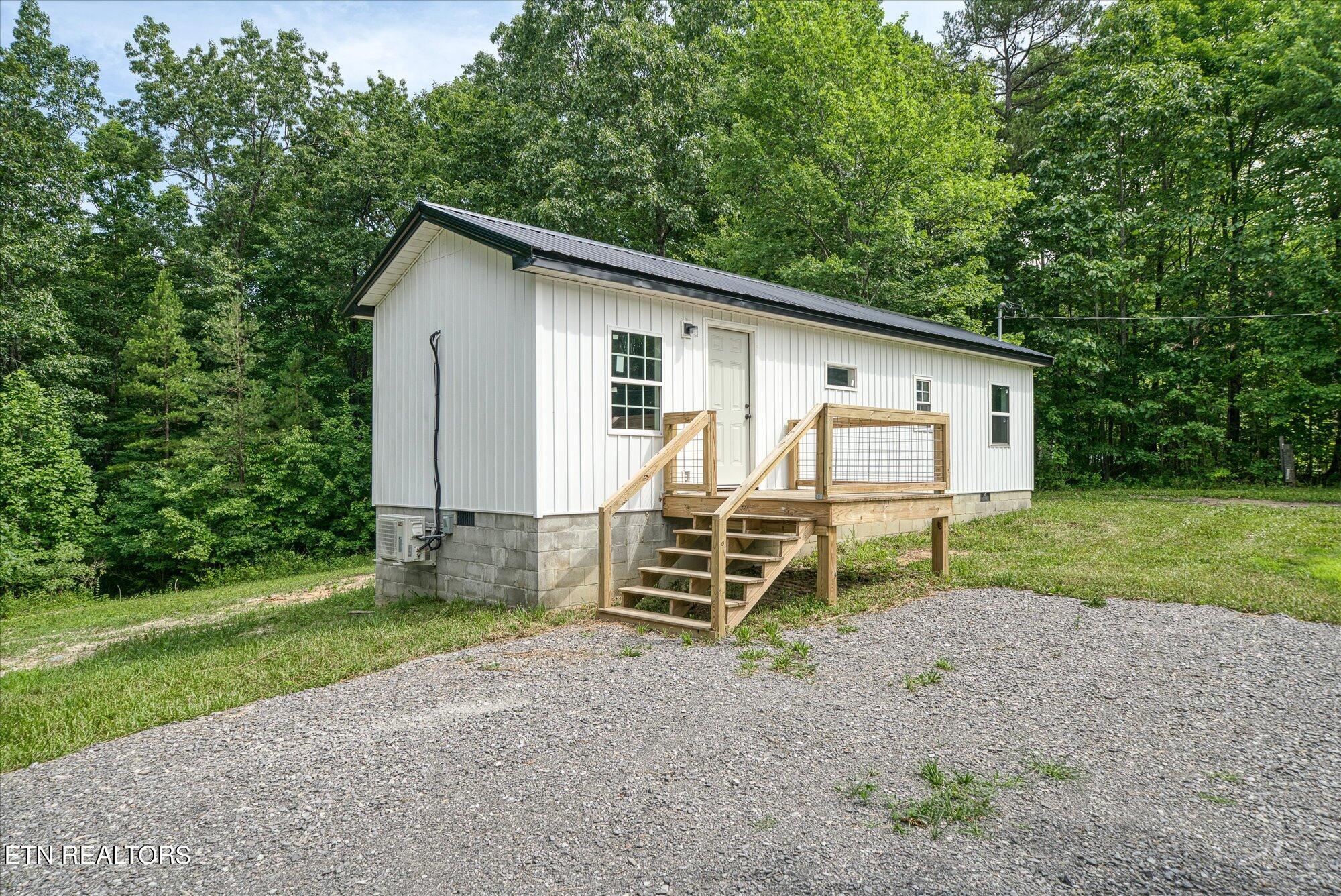 837 Slaven Ridge Road Jamestown, TN 38556 - Photo 1 of 22 03-837 Slaven Ridge Rd-19-2