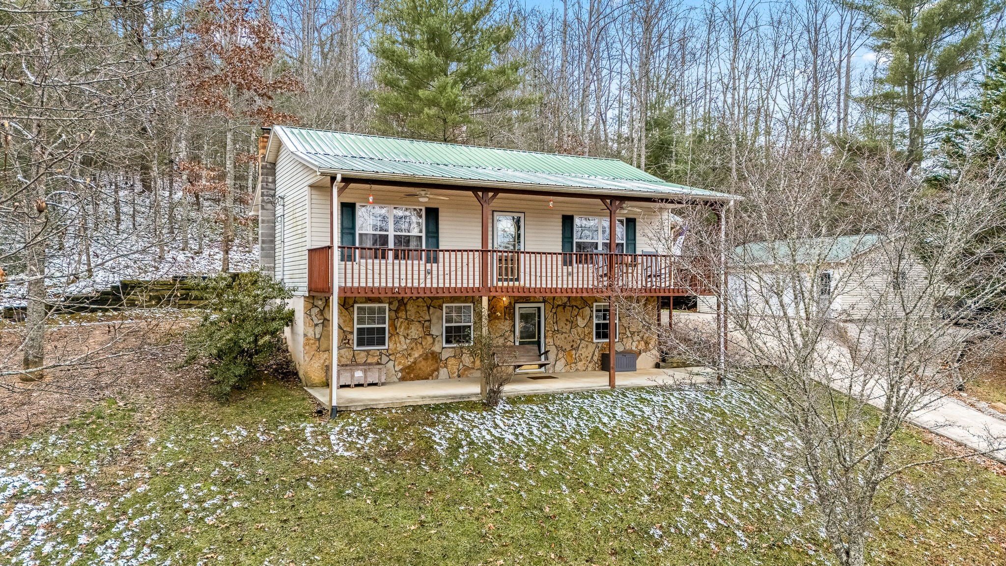 165 Bart Woolum Road Lancing, TN 37770 - Photo 8 of 61 front view of a house with a yard