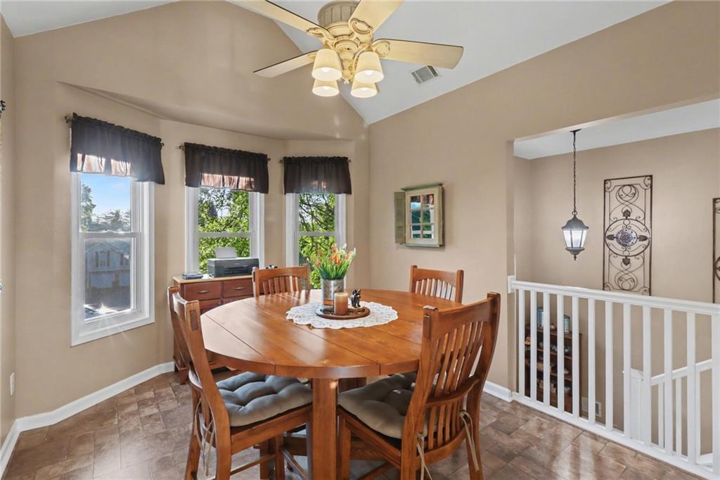 65 Indian Hills Drive Rydal, GA 30171 - Photo 12 of 32 a view of a dining room with furniture window and outside view