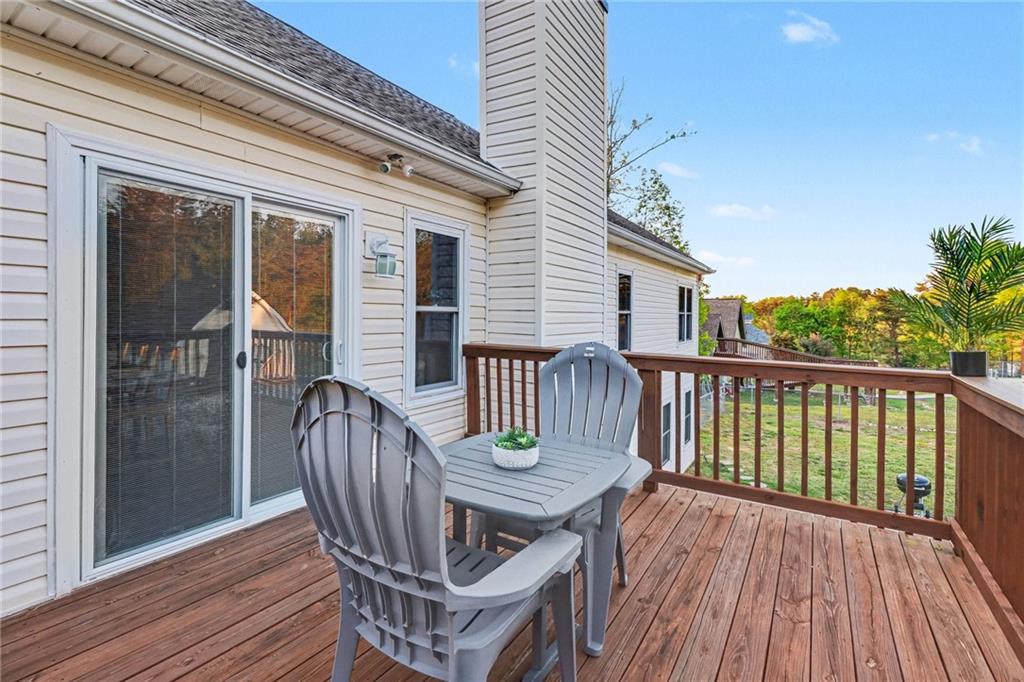 65 Indian Hills Drive Rydal, GA 30171 - Photo 28 of 32 a view of a balcony with furniture