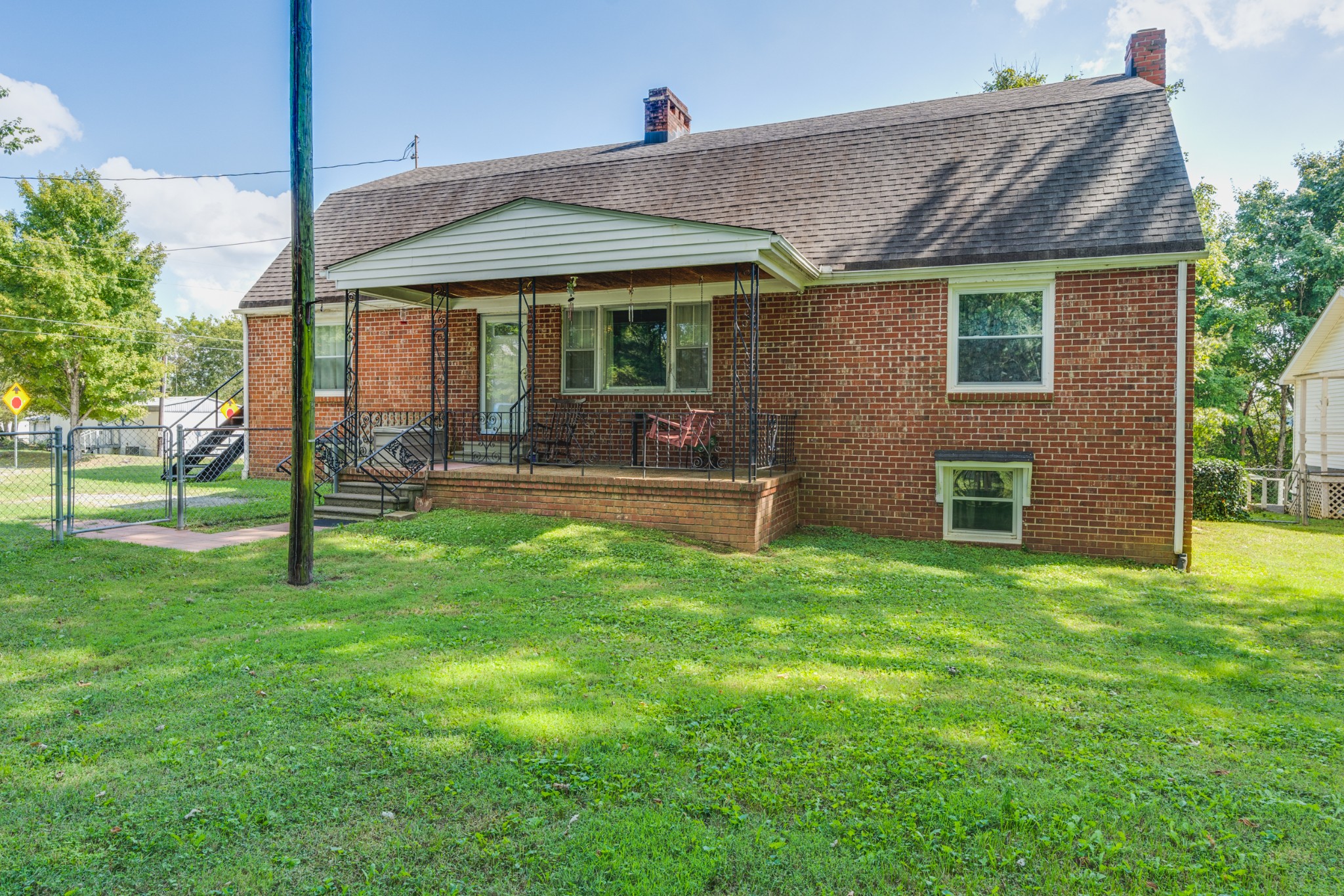8915 Lyles Road Lyles, TN 37098 - Photo 2 of 39 a front view of a house with a yard