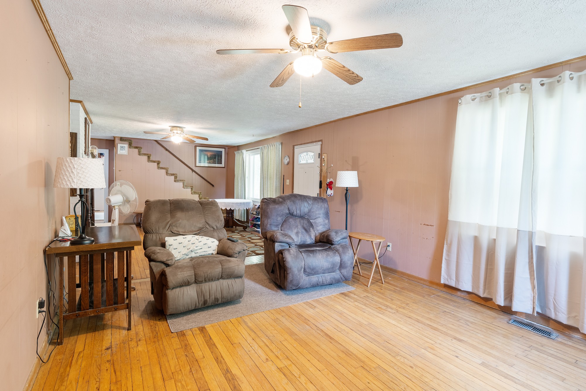 8915 Lyles Road Lyles, TN 37098 - Photo 11 of 39 a living room with furniture and a wooden floor