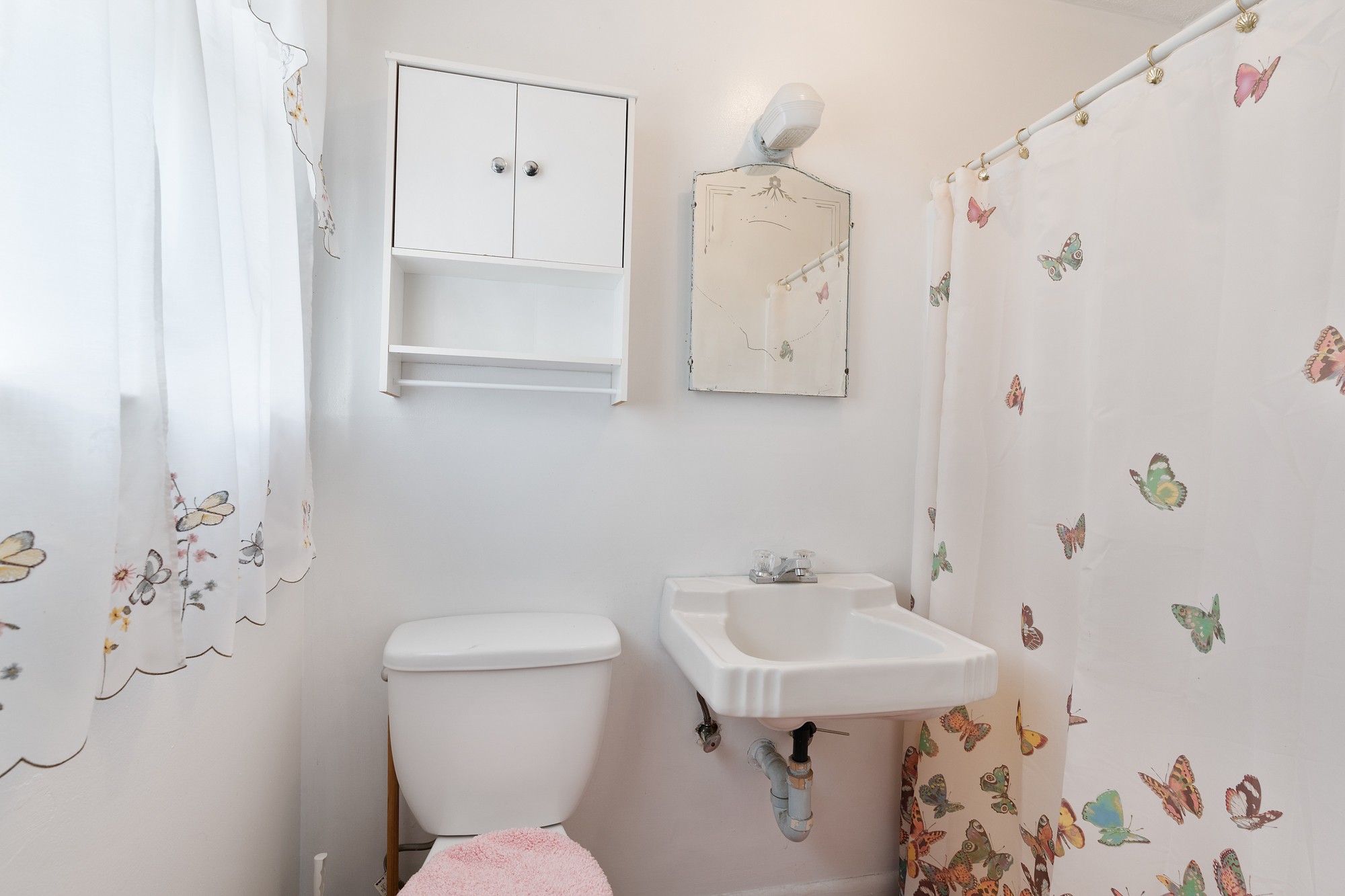 8915 Lyles Road Lyles, TN 37098 - Photo 19 of 39 a bathroom with a sink toilet and shower