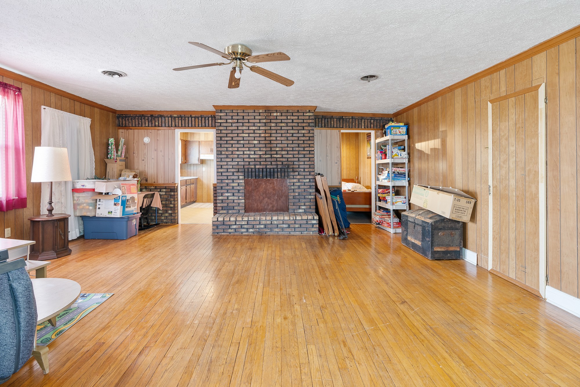 8915 Lyles Road Lyles, TN 37098 - Photo 26 of 39 a living room with furniture and a wooden floor
