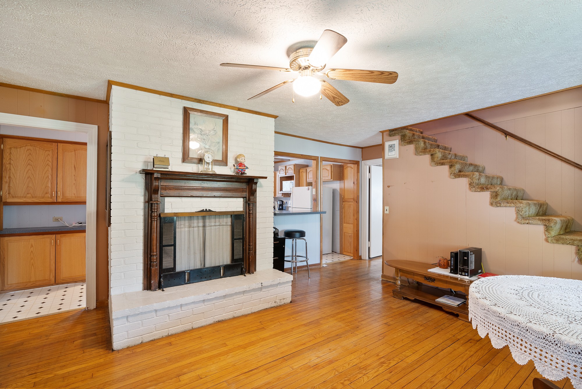 8915 Lyles Road Lyles, TN 37098 - Photo 9 of 39 a living room with furniture and a fireplace